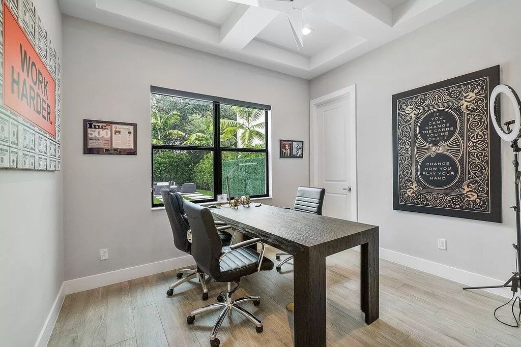The Home in Boca Raton, a contemporary estate offers notable features include concrete construction, impact glass, custom entry ''pivot'' door, wine storage, theater room  is now available for sale. This home located at 17558 Cadena Dr, Boca Raton, Florida