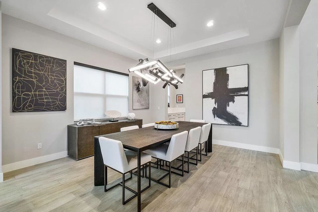 The Home in Boca Raton, a contemporary estate offers notable features include concrete construction, impact glass, custom entry ''pivot'' door, wine storage, theater room  is now available for sale. This home located at 17558 Cadena Dr, Boca Raton, Florida