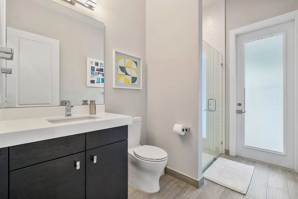 The Home in Boca Raton, a contemporary estate offers notable features include concrete construction, impact glass, custom entry ''pivot'' door, wine storage, theater room  is now available for sale. This home located at 17558 Cadena Dr, Boca Raton, Florida