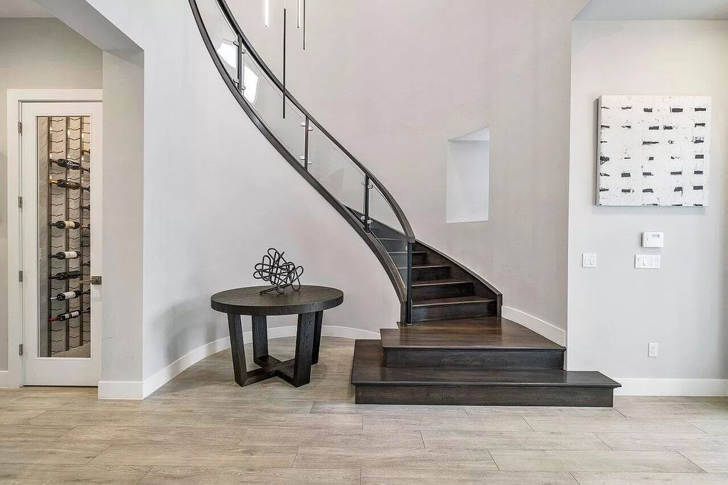 The Home in Boca Raton, a contemporary estate offers notable features include concrete construction, impact glass, custom entry ''pivot'' door, wine storage, theater room  is now available for sale. This home located at 17558 Cadena Dr, Boca Raton, Florida