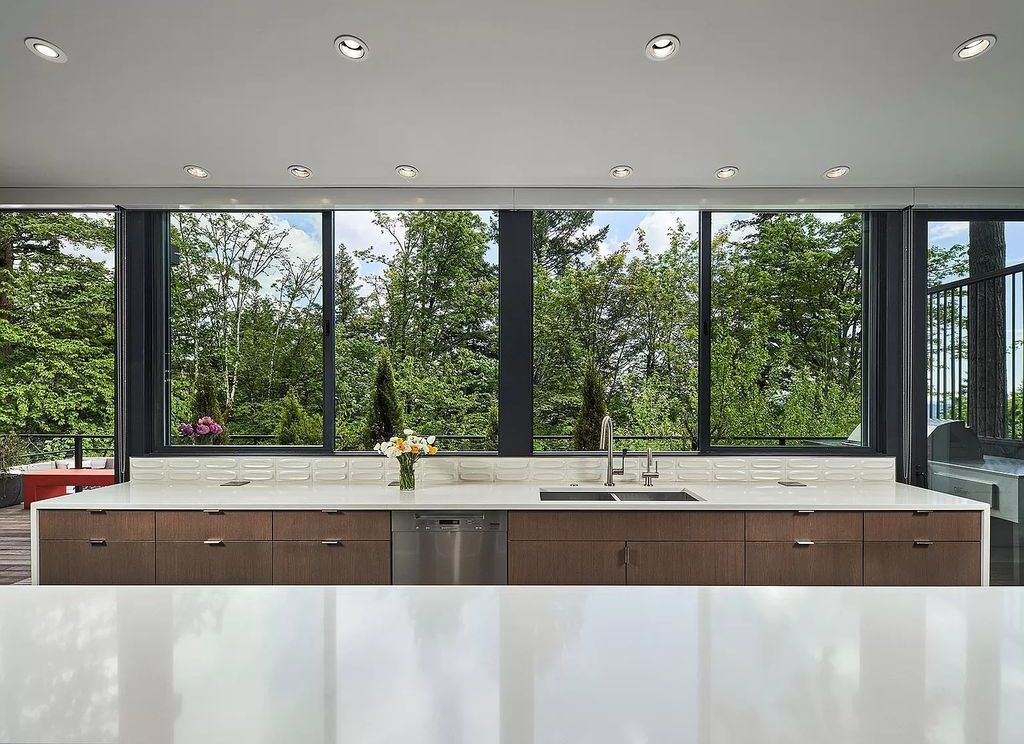 The Home in Portland is a true modern masterpiece designed by Craig Wollen, now available for sale. This home located at 4112 SW Greenhills Way, Portland, Oregon