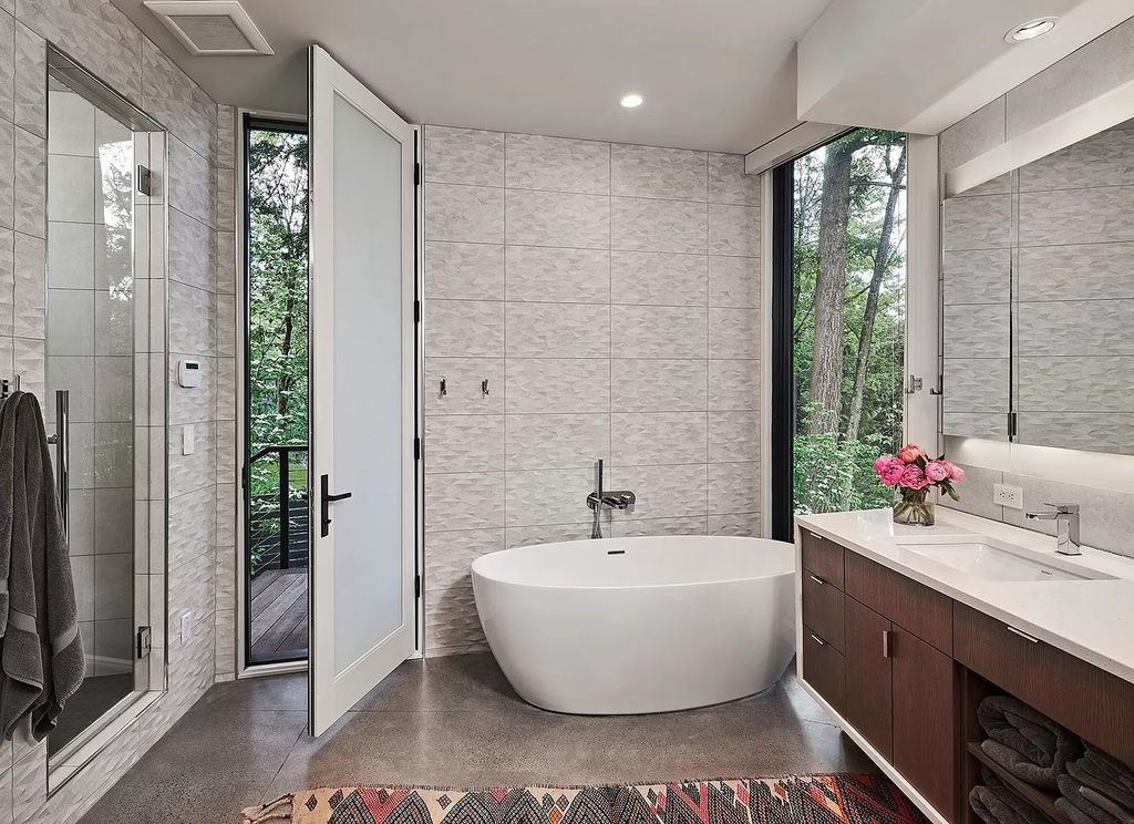 The Home in Portland is a true modern masterpiece designed by Craig Wollen, now available for sale. This home located at 4112 SW Greenhills Way, Portland, Oregon