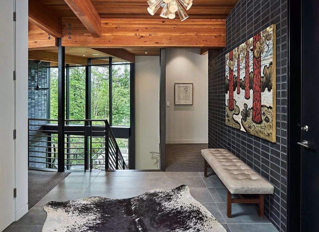 The Home in Portland is a true modern masterpiece designed by Craig Wollen, now available for sale. This home located at 4112 SW Greenhills Way, Portland, Oregon