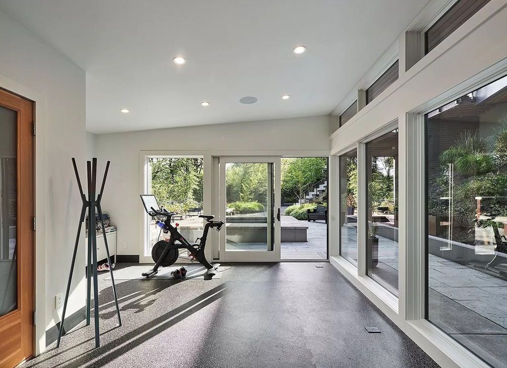 The Home in Portland is a true modern masterpiece designed by Craig Wollen, now available for sale. This home located at 4112 SW Greenhills Way, Portland, Oregon