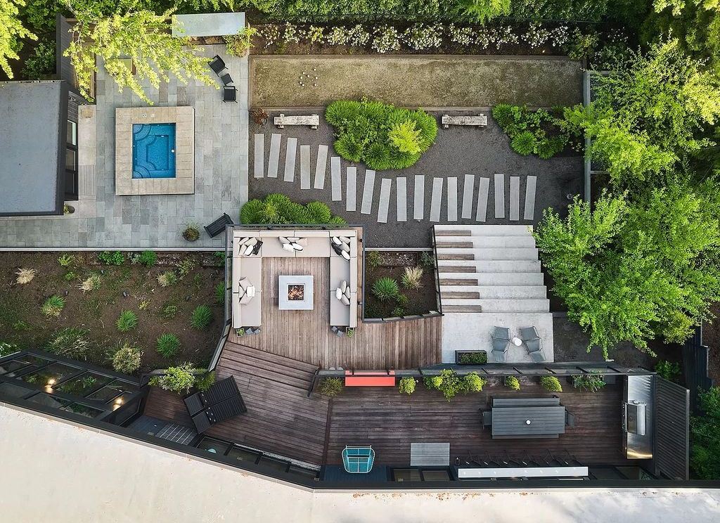 The Home in Portland is a true modern masterpiece designed by Craig Wollen, now available for sale. This home located at 4112 SW Greenhills Way, Portland, Oregon