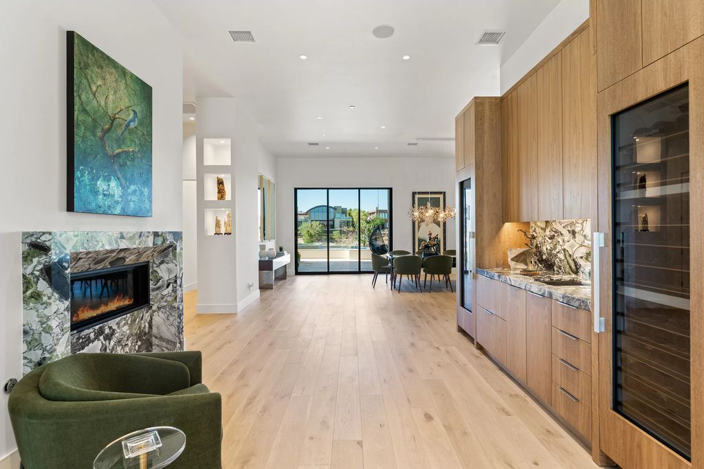 The Home in Las Vegas, a dramatic custom masterpiece with panoramic Red Rock Conservation views defines modern sophistication with sleek timeless finishes is now available for sale. This house located at 74 Meadowhawk Ln, Las Vegas, Nevada