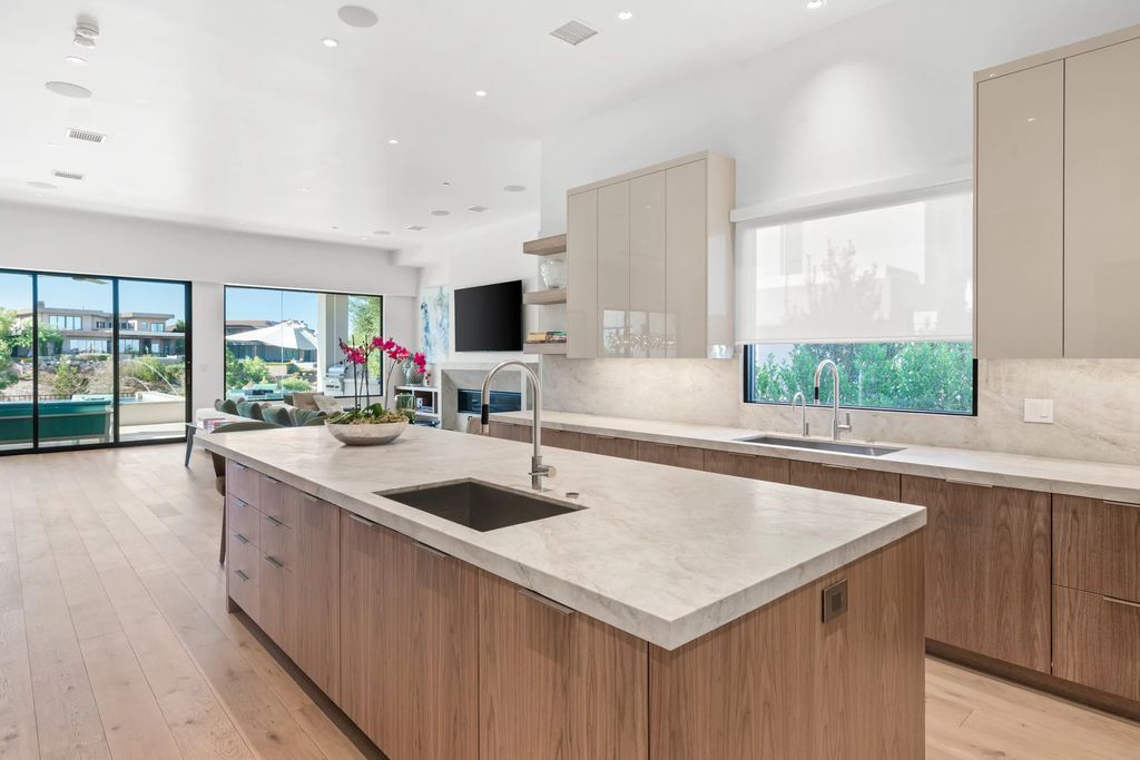 The Home in Las Vegas, a dramatic custom masterpiece with panoramic Red Rock Conservation views defines modern sophistication with sleek timeless finishes is now available for sale. This house located at 74 Meadowhawk Ln, Las Vegas, Nevada