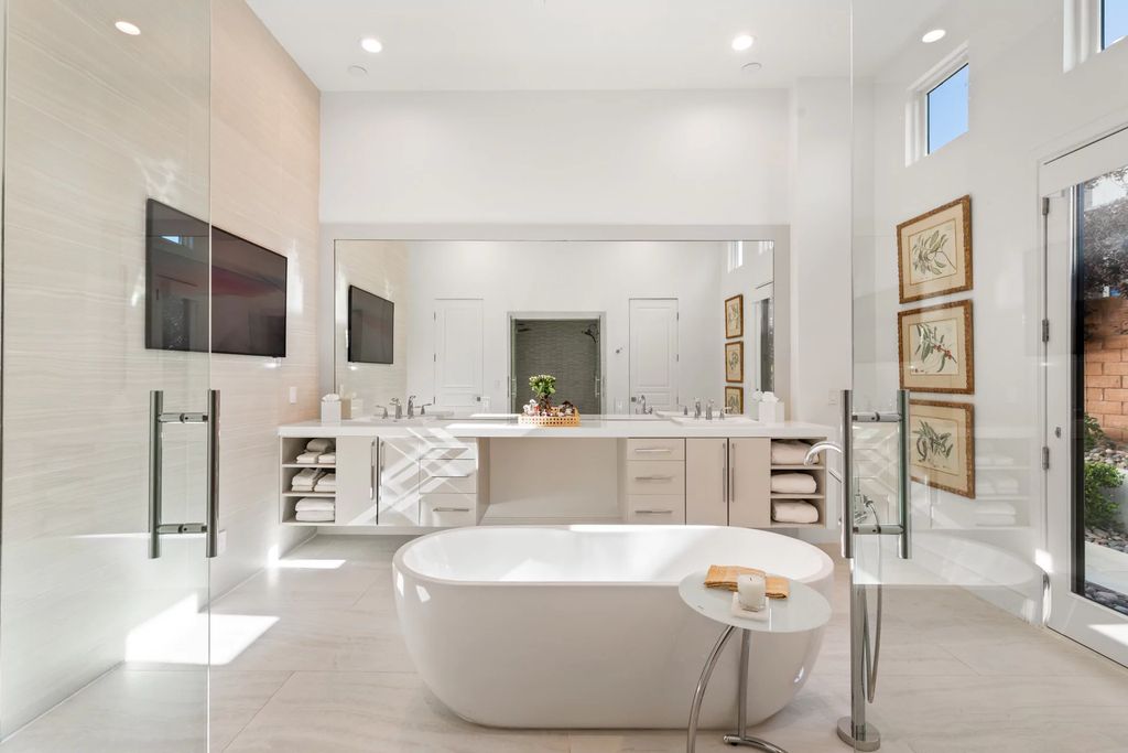 The Home in Las Vegas, a dramatic custom masterpiece with panoramic Red Rock Conservation views defines modern sophistication with sleek timeless finishes is now available for sale. This house located at 74 Meadowhawk Ln, Las Vegas, Nevada