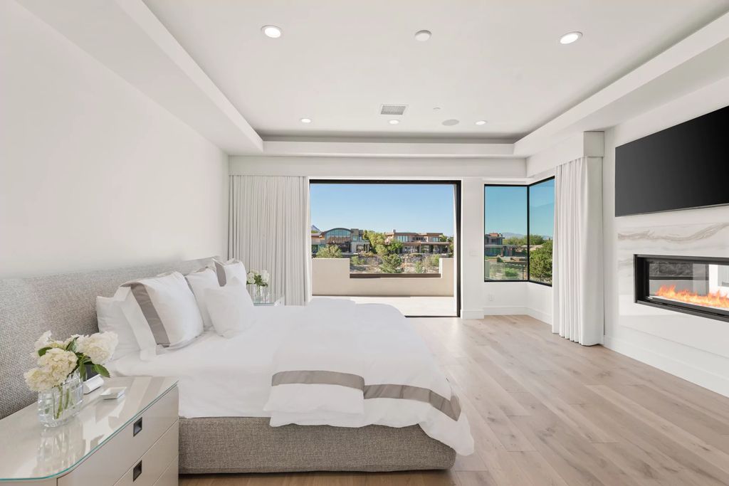 The Home in Las Vegas, a dramatic custom masterpiece with panoramic Red Rock Conservation views defines modern sophistication with sleek timeless finishes is now available for sale. This house located at 74 Meadowhawk Ln, Las Vegas, Nevada