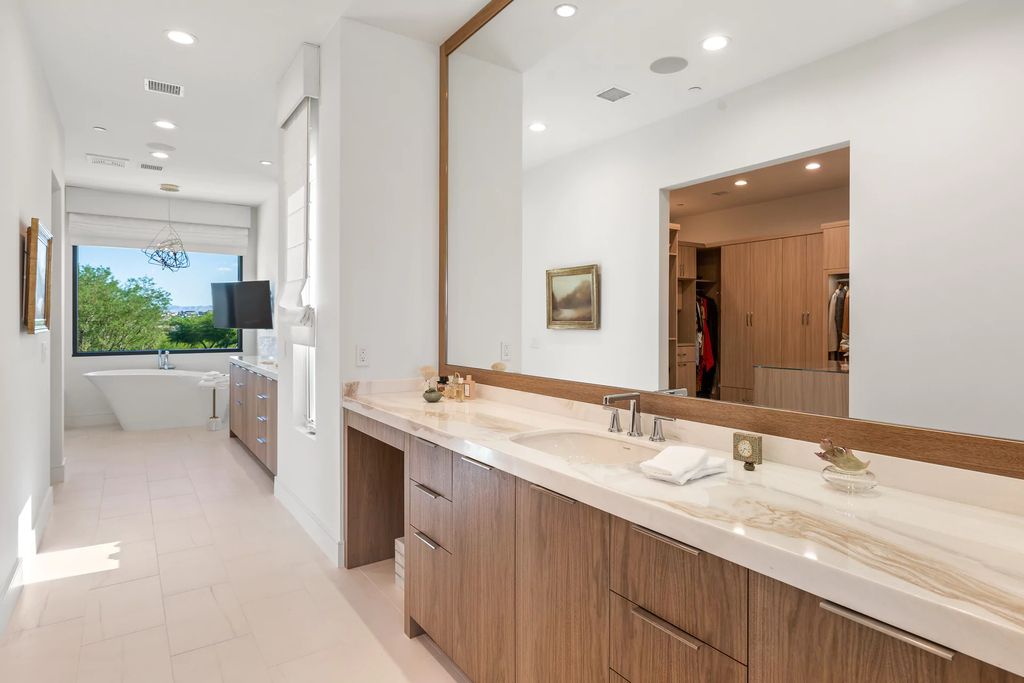 The Home in Las Vegas, a dramatic custom masterpiece with panoramic Red Rock Conservation views defines modern sophistication with sleek timeless finishes is now available for sale. This house located at 74 Meadowhawk Ln, Las Vegas, Nevada