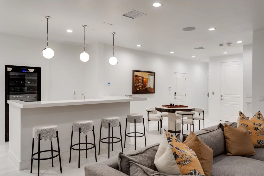 The Home in Las Vegas, a dramatic custom masterpiece with panoramic Red Rock Conservation views defines modern sophistication with sleek timeless finishes is now available for sale. This house located at 74 Meadowhawk Ln, Las Vegas, Nevada