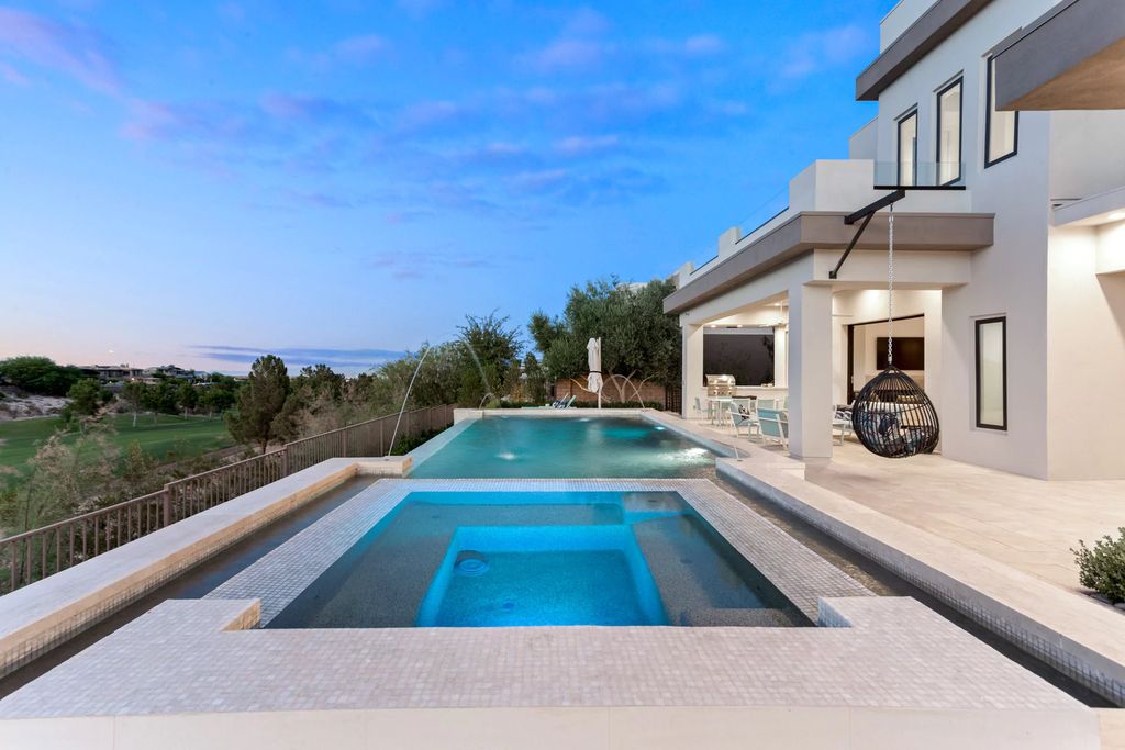 The Home in Las Vegas, a dramatic custom masterpiece with panoramic Red Rock Conservation views defines modern sophistication with sleek timeless finishes is now available for sale. This house located at 74 Meadowhawk Ln, Las Vegas, Nevada