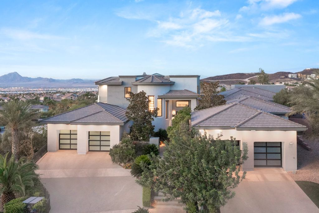 The Henderson Home, a newly renovated double-gated residence spotlights high ceilings, curved staircases, an open floor plan and an amazing outdoor area is now available for sale. This home located at 578 Lairmont Pl, Henderson, Nevada