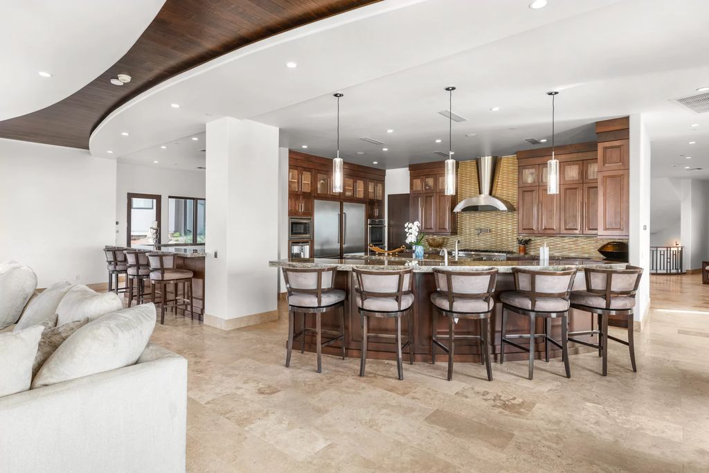 The Henderson Home, a newly renovated double-gated residence spotlights high ceilings, curved staircases, an open floor plan and an amazing outdoor area is now available for sale. This home located at 578 Lairmont Pl, Henderson, Nevada