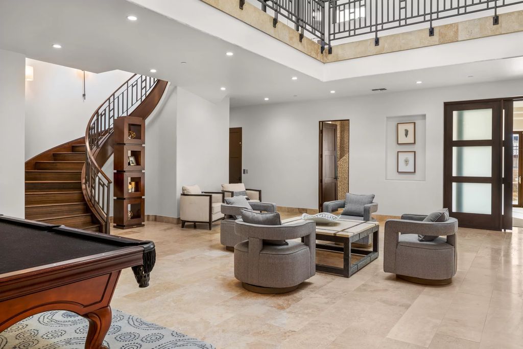 The Henderson Home, a newly renovated double-gated residence spotlights high ceilings, curved staircases, an open floor plan and an amazing outdoor area is now available for sale. This home located at 578 Lairmont Pl, Henderson, Nevada
