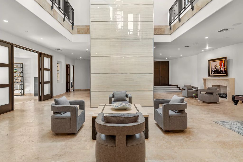 The Henderson Home, a newly renovated double-gated residence spotlights high ceilings, curved staircases, an open floor plan and an amazing outdoor area is now available for sale. This home located at 578 Lairmont Pl, Henderson, Nevada