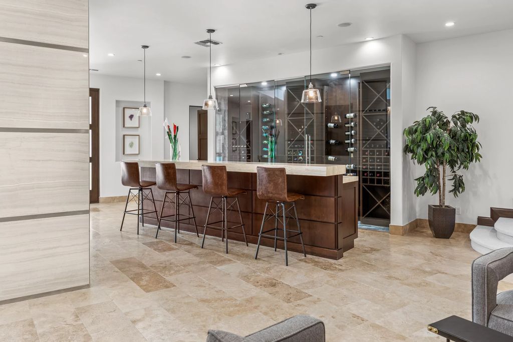 The Henderson Home, a newly renovated double-gated residence spotlights high ceilings, curved staircases, an open floor plan and an amazing outdoor area is now available for sale. This home located at 578 Lairmont Pl, Henderson, Nevada