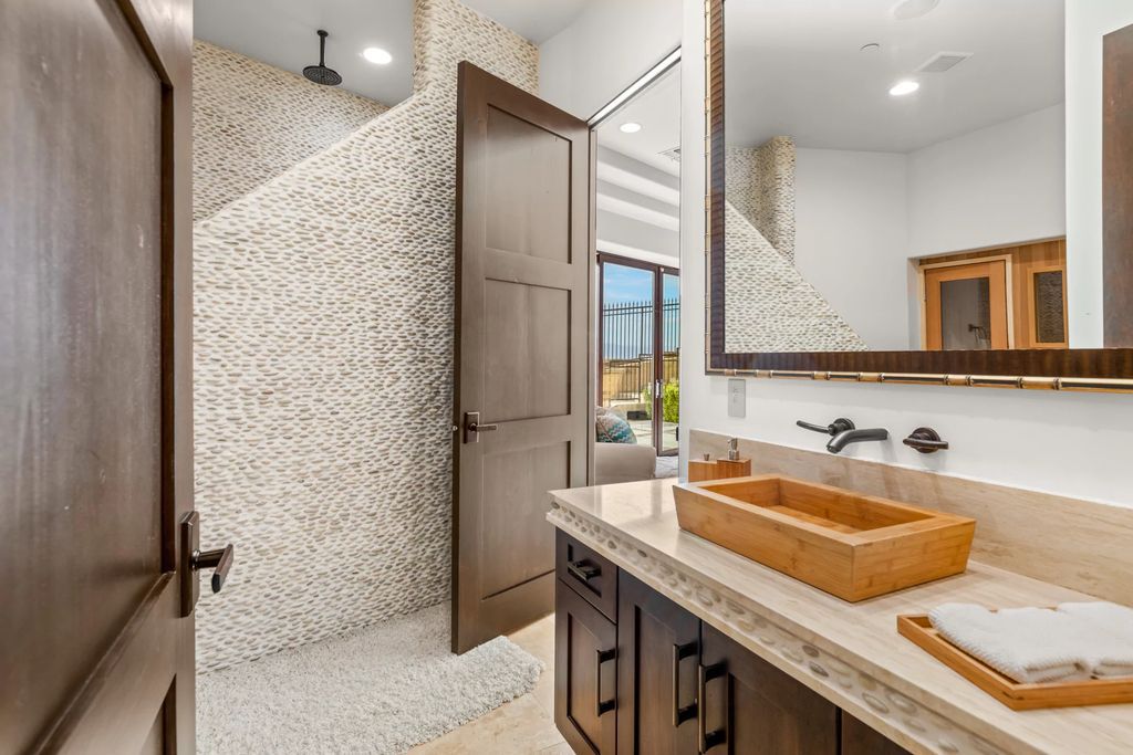 The Henderson Home, a newly renovated double-gated residence spotlights high ceilings, curved staircases, an open floor plan and an amazing outdoor area is now available for sale. This home located at 578 Lairmont Pl, Henderson, Nevada