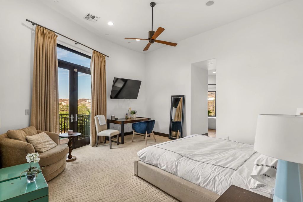 The Henderson Home, a newly renovated double-gated residence spotlights high ceilings, curved staircases, an open floor plan and an amazing outdoor area is now available for sale. This home located at 578 Lairmont Pl, Henderson, Nevada