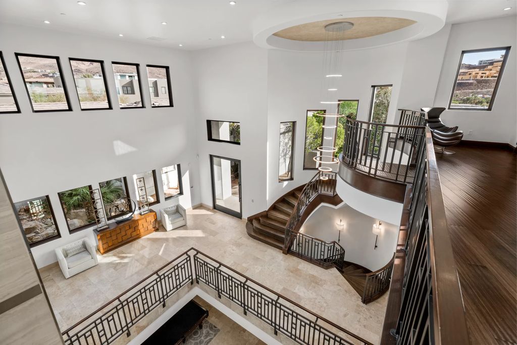 The Henderson Home, a newly renovated double-gated residence spotlights high ceilings, curved staircases, an open floor plan and an amazing outdoor area is now available for sale. This home located at 578 Lairmont Pl, Henderson, Nevada