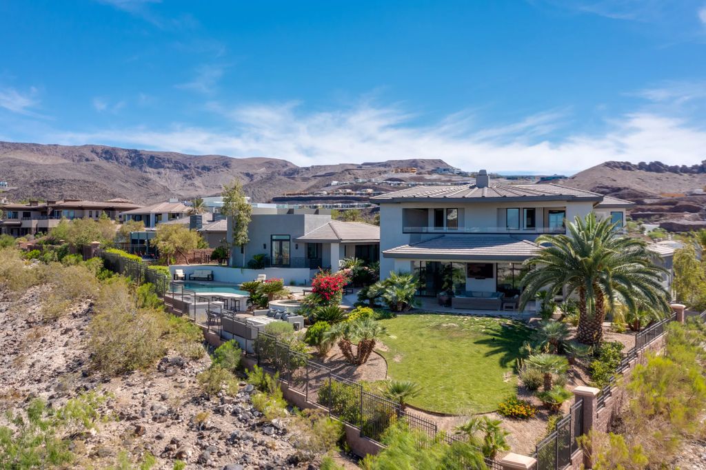 The Henderson Home, a newly renovated double-gated residence spotlights high ceilings, curved staircases, an open floor plan and an amazing outdoor area is now available for sale. This home located at 578 Lairmont Pl, Henderson, Nevada