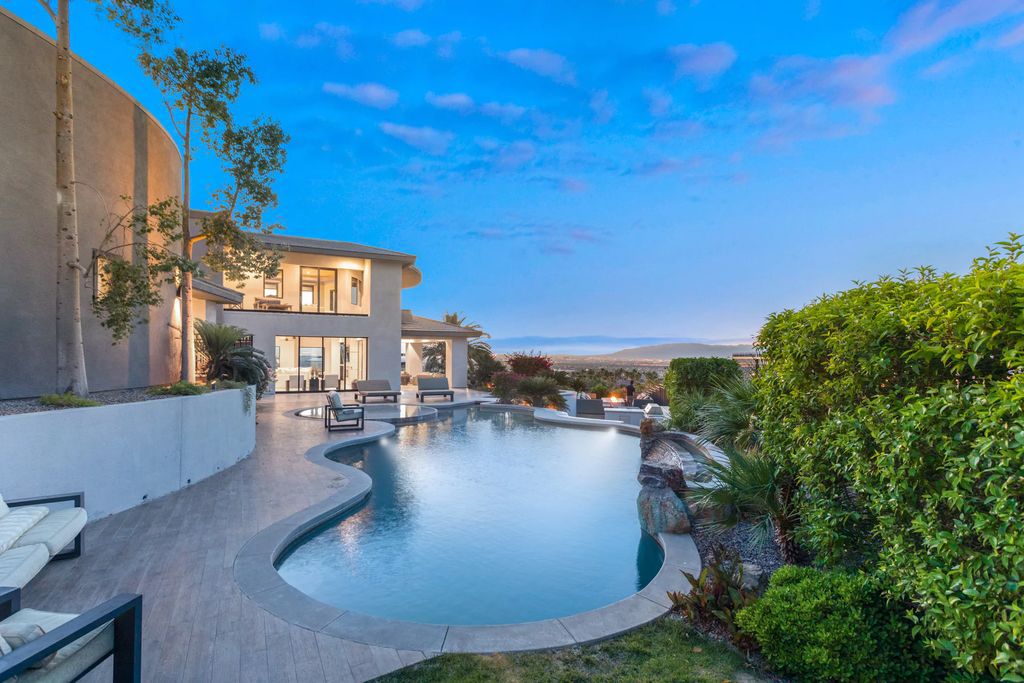 The Henderson Home, a newly renovated double-gated residence spotlights high ceilings, curved staircases, an open floor plan and an amazing outdoor area is now available for sale. This home located at 578 Lairmont Pl, Henderson, Nevada