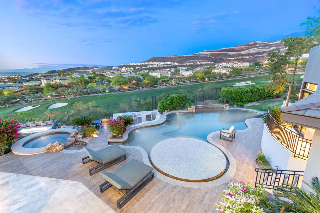 The Henderson Home, a newly renovated double-gated residence spotlights high ceilings, curved staircases, an open floor plan and an amazing outdoor area is now available for sale. This home located at 578 Lairmont Pl, Henderson, Nevada