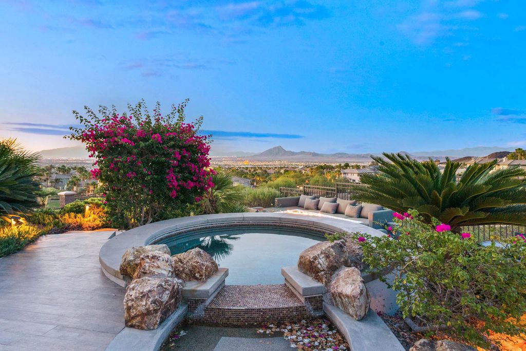 The Henderson Home, a newly renovated double-gated residence spotlights high ceilings, curved staircases, an open floor plan and an amazing outdoor area is now available for sale. This home located at 578 Lairmont Pl, Henderson, Nevada