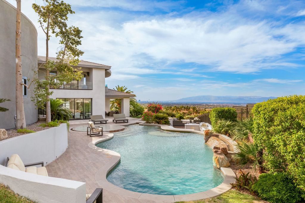 The Henderson Home, a newly renovated double-gated residence spotlights high ceilings, curved staircases, an open floor plan and an amazing outdoor area is now available for sale. This home located at 578 Lairmont Pl, Henderson, Nevada