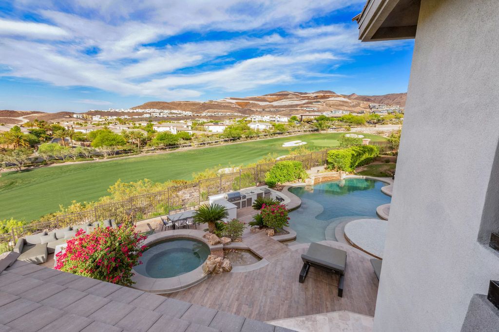The Henderson Home, a newly renovated double-gated residence spotlights high ceilings, curved staircases, an open floor plan and an amazing outdoor area is now available for sale. This home located at 578 Lairmont Pl, Henderson, Nevada