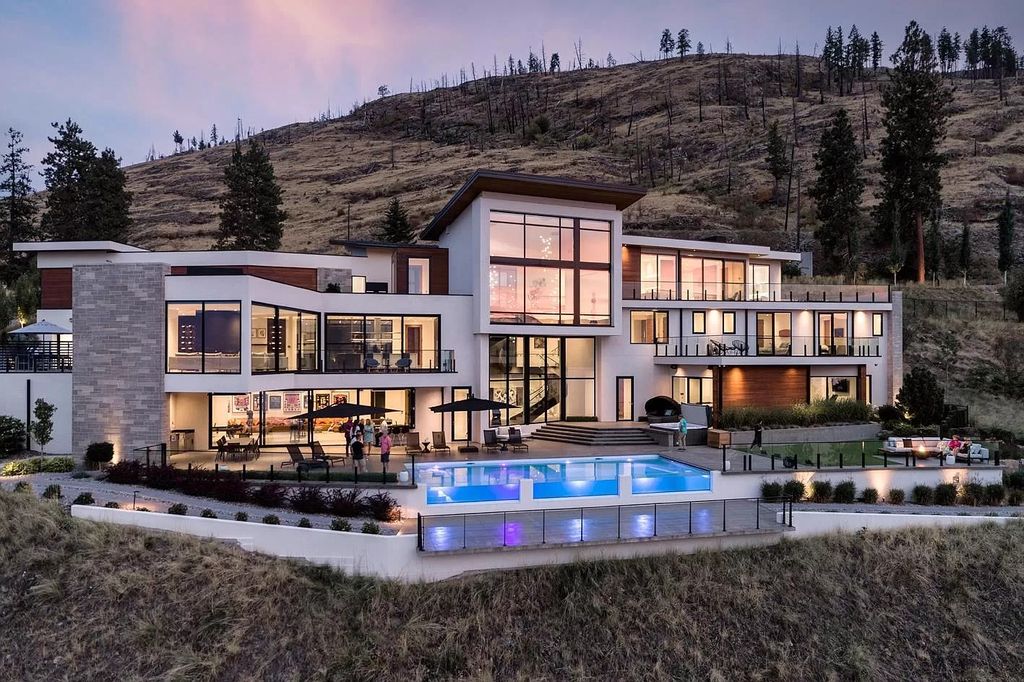 The Home in Kelowna offers unparalleled amenities, including stunning Japanese-inspired hidden garden, beach house, pool, and so much more, now available for sale. This home located at 6950 Lakeshore Rd, Kelowna, BC V1W 4J5, Canada