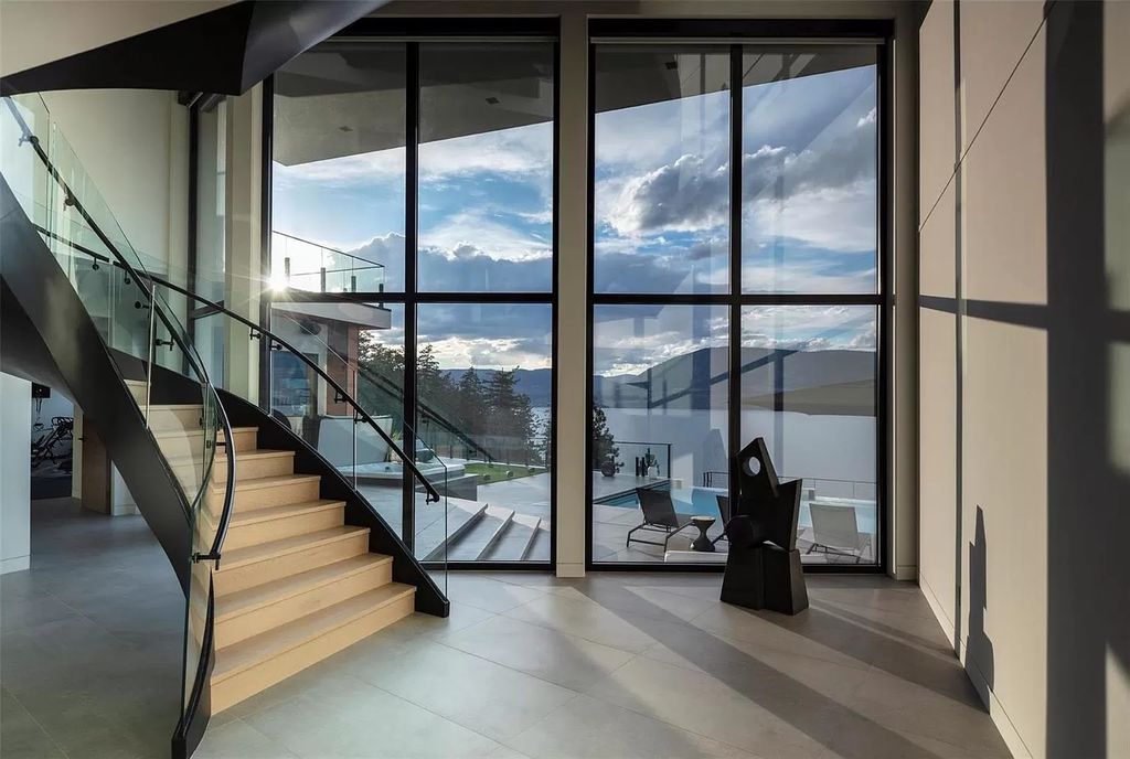 The Home in Kelowna offers unparalleled amenities, including stunning Japanese-inspired hidden garden, beach house, pool, and so much more, now available for sale. This home located at 6950 Lakeshore Rd, Kelowna, BC V1W 4J5, Canada