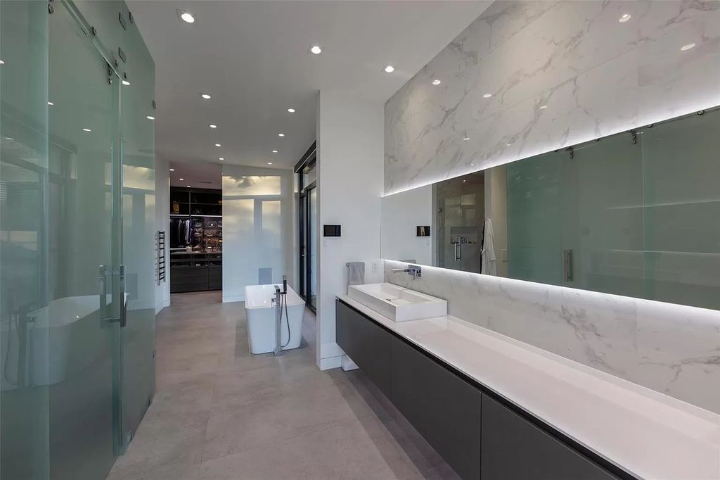 The Home in Kelowna offers unparalleled amenities, including stunning Japanese-inspired hidden garden, beach house, pool, and so much more, now available for sale. This home located at 6950 Lakeshore Rd, Kelowna, BC V1W 4J5, Canada
