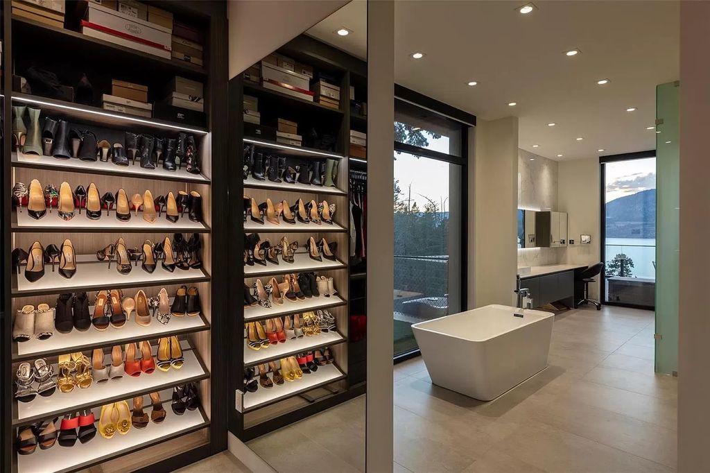 The Home in Kelowna offers unparalleled amenities, including stunning Japanese-inspired hidden garden, beach house, pool, and so much more, now available for sale. This home located at 6950 Lakeshore Rd, Kelowna, BC V1W 4J5, Canada