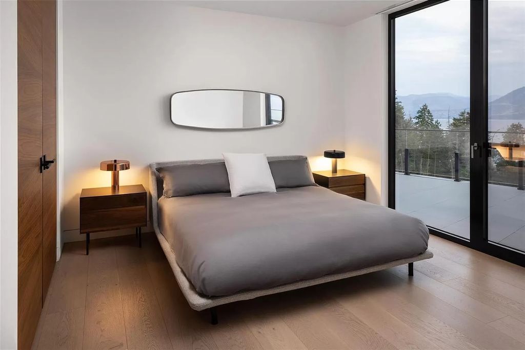 The Home in Kelowna offers unparalleled amenities, including stunning Japanese-inspired hidden garden, beach house, pool, and so much more, now available for sale. This home located at 6950 Lakeshore Rd, Kelowna, BC V1W 4J5, Canada