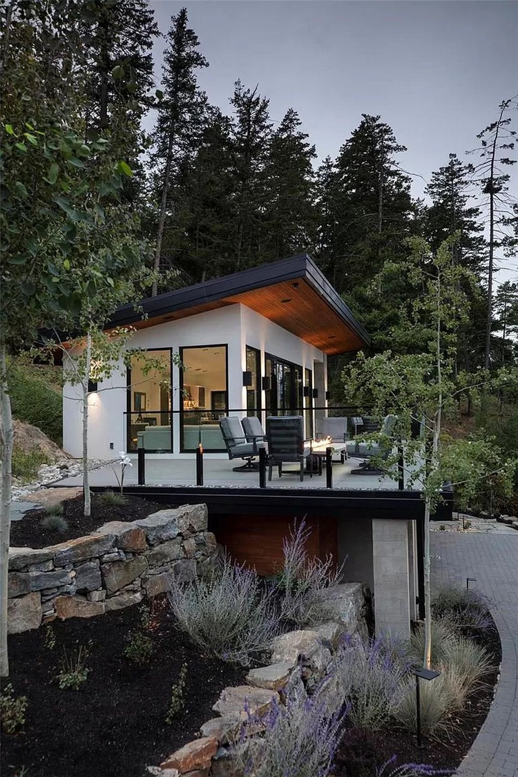 The Home in Kelowna offers unparalleled amenities, including stunning Japanese-inspired hidden garden, beach house, pool, and so much more, now available for sale. This home located at 6950 Lakeshore Rd, Kelowna, BC V1W 4J5, Canada