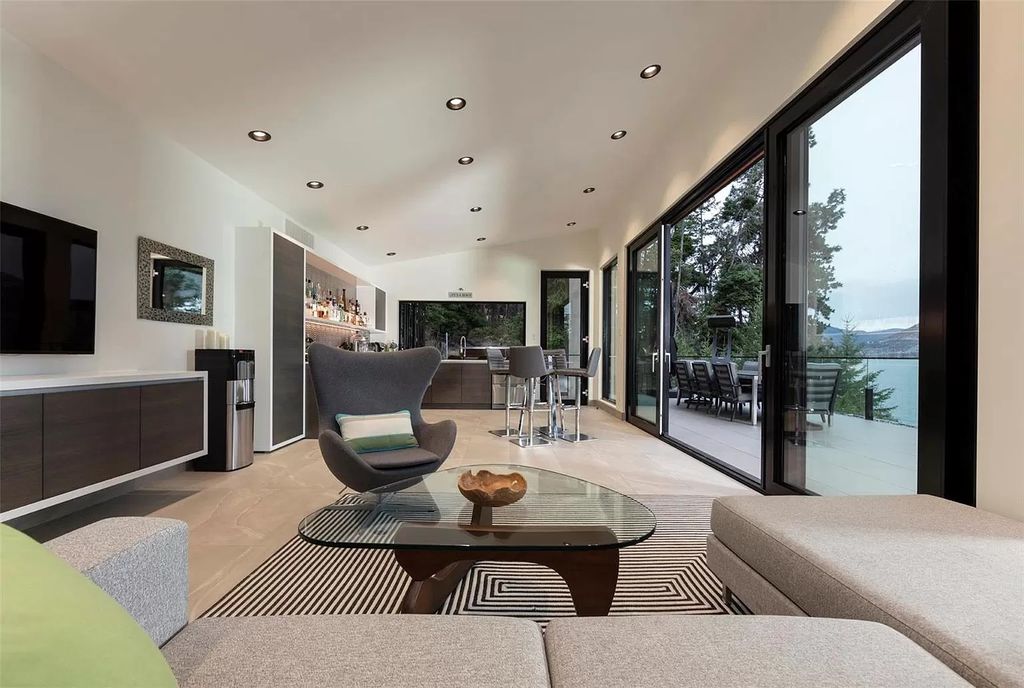The Home in Kelowna offers unparalleled amenities, including stunning Japanese-inspired hidden garden, beach house, pool, and so much more, now available for sale. This home located at 6950 Lakeshore Rd, Kelowna, BC V1W 4J5, Canada