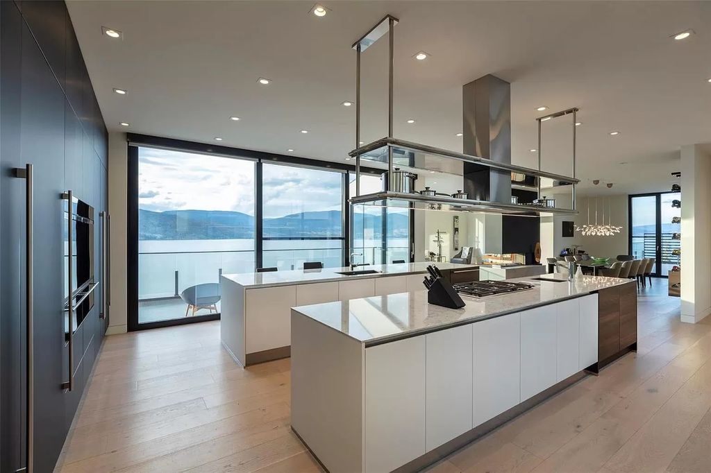 The Home in Kelowna offers unparalleled amenities, including stunning Japanese-inspired hidden garden, beach house, pool, and so much more, now available for sale. This home located at 6950 Lakeshore Rd, Kelowna, BC V1W 4J5, Canada