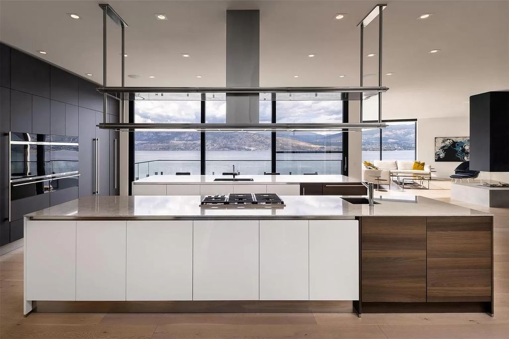 The Home in Kelowna offers unparalleled amenities, including stunning Japanese-inspired hidden garden, beach house, pool, and so much more, now available for sale. This home located at 6950 Lakeshore Rd, Kelowna, BC V1W 4J5, Canada