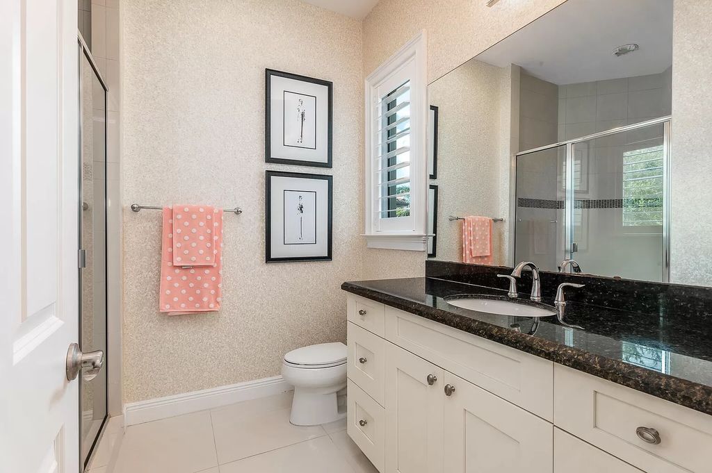 The Boca Raton Home, a smart residence is located on a premium lot overlooking the grand lake and features a breathtaking backyard is now available for sale. This home located at 9099 Redonda Dr, Boca Raton, Florida