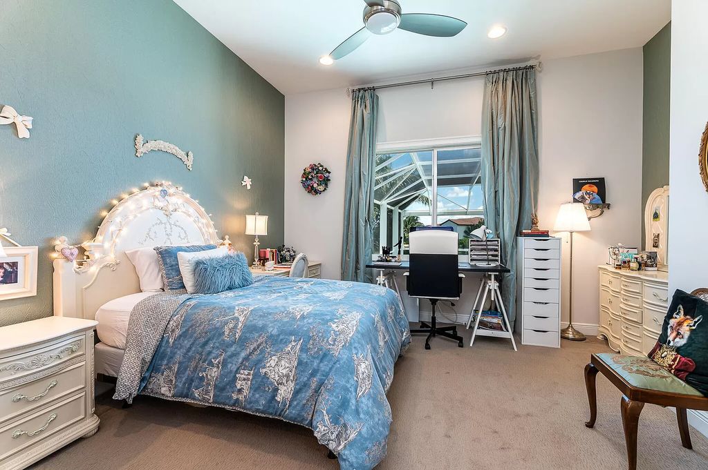 The Boca Raton Home, a smart residence is located on a premium lot overlooking the grand lake and features a breathtaking backyard is now available for sale. This home located at 9099 Redonda Dr, Boca Raton, Florida