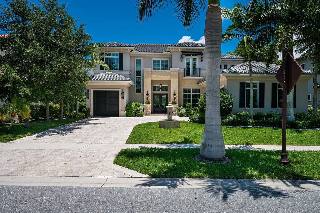 The Boca Raton Home, a smart residence is located on a premium lot overlooking the grand lake and features a breathtaking backyard is now available for sale. This home located at 9099 Redonda Dr, Boca Raton, Florida