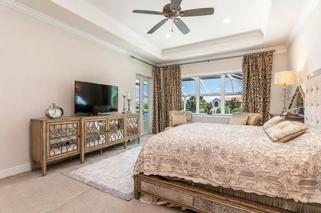 The Boca Raton Home, a smart residence is located on a premium lot overlooking the grand lake and features a breathtaking backyard is now available for sale. This home located at 9099 Redonda Dr, Boca Raton, Florida