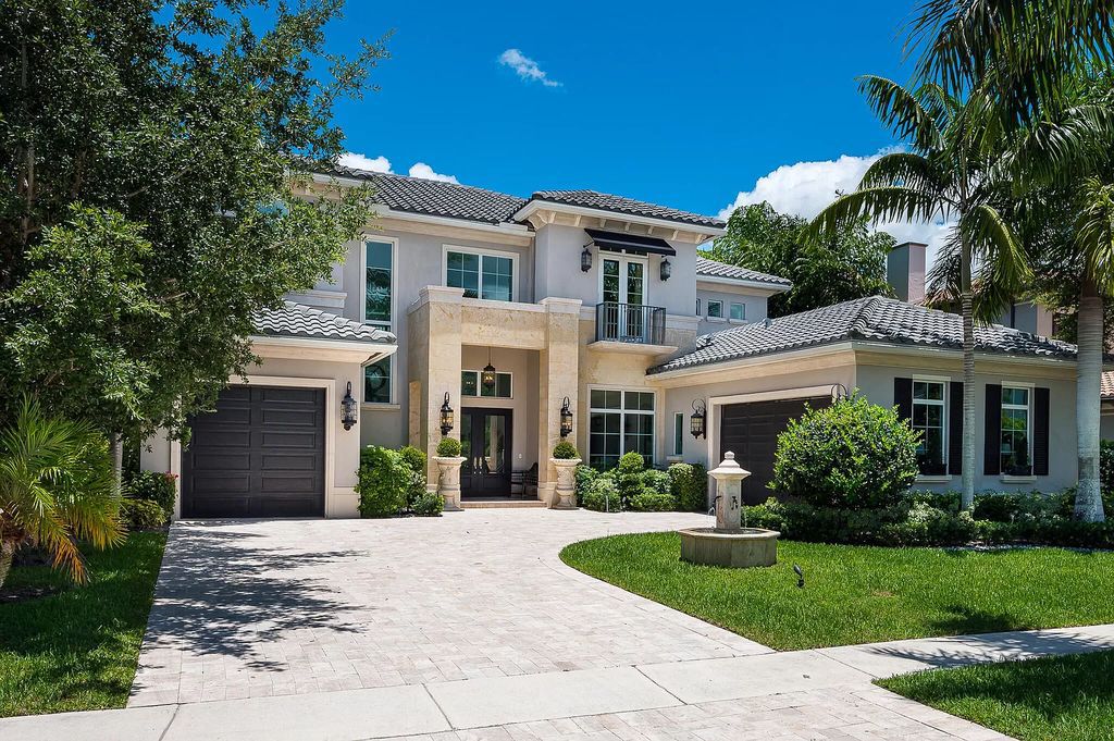 The Boca Raton Home, a smart residence is located on a premium lot overlooking the grand lake and features a breathtaking backyard is now available for sale. This home located at 9099 Redonda Dr, Boca Raton, Florida