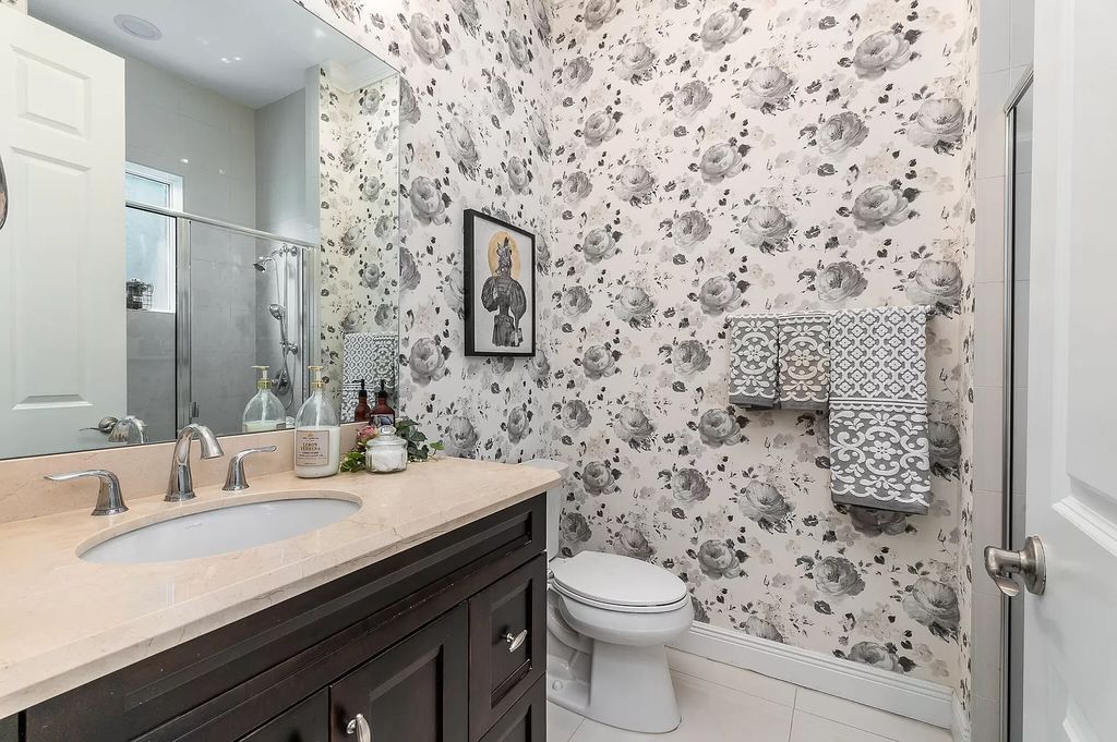 The Boca Raton Home, a smart residence is located on a premium lot overlooking the grand lake and features a breathtaking backyard is now available for sale. This home located at 9099 Redonda Dr, Boca Raton, Florida