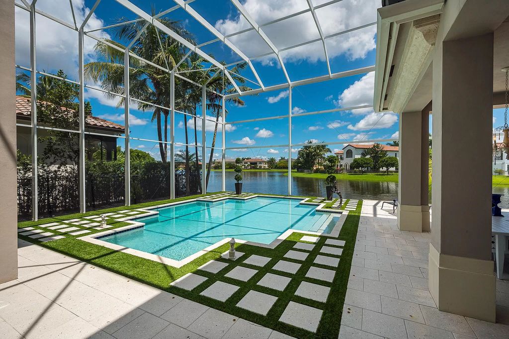 The Boca Raton Home, a smart residence is located on a premium lot overlooking the grand lake and features a breathtaking backyard is now available for sale. This home located at 9099 Redonda Dr, Boca Raton, Florida