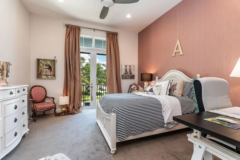 The Boca Raton Home, a smart residence is located on a premium lot overlooking the grand lake and features a breathtaking backyard is now available for sale. This home located at 9099 Redonda Dr, Boca Raton, Florida