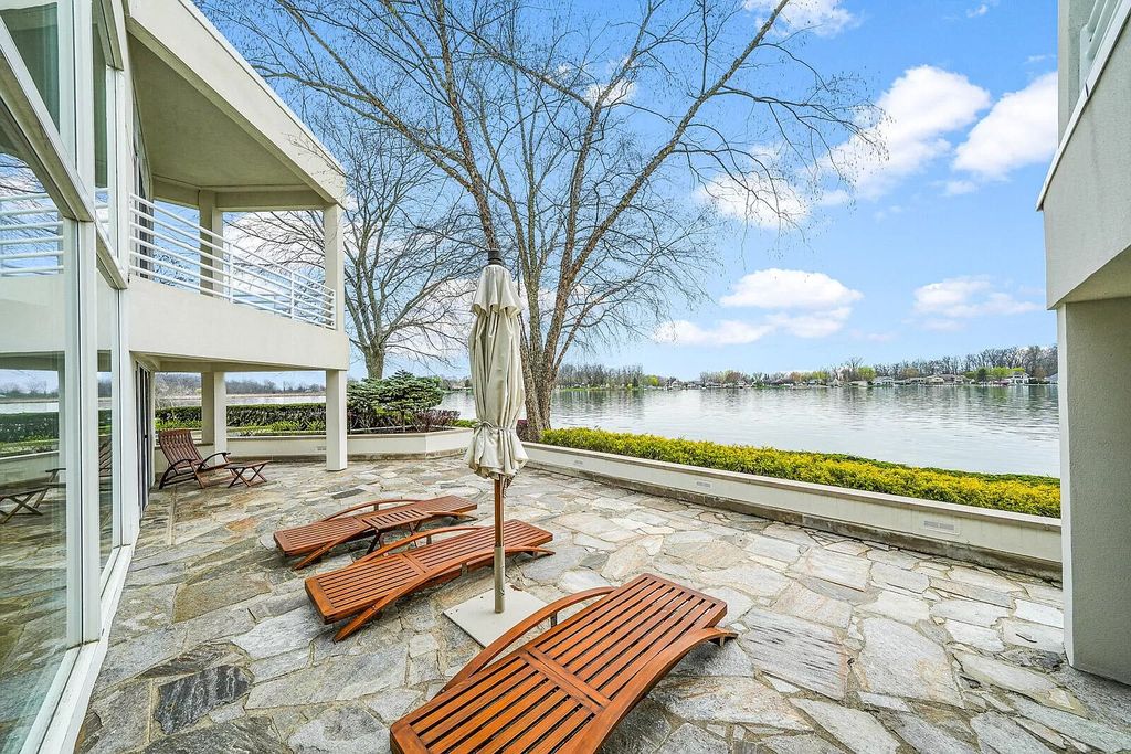 The House in Cassopolis has a Luxury Miami Vibe and a well-designed floor plan with separate split upper levels, now available for sale. This home located at 62234 Carlton Dr, Cassopolis, Michigan