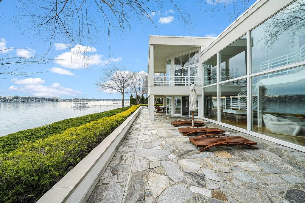 The House in Cassopolis has a Luxury Miami Vibe and a well-designed floor plan with separate split upper levels, now available for sale. This home located at 62234 Carlton Dr, Cassopolis, Michigan