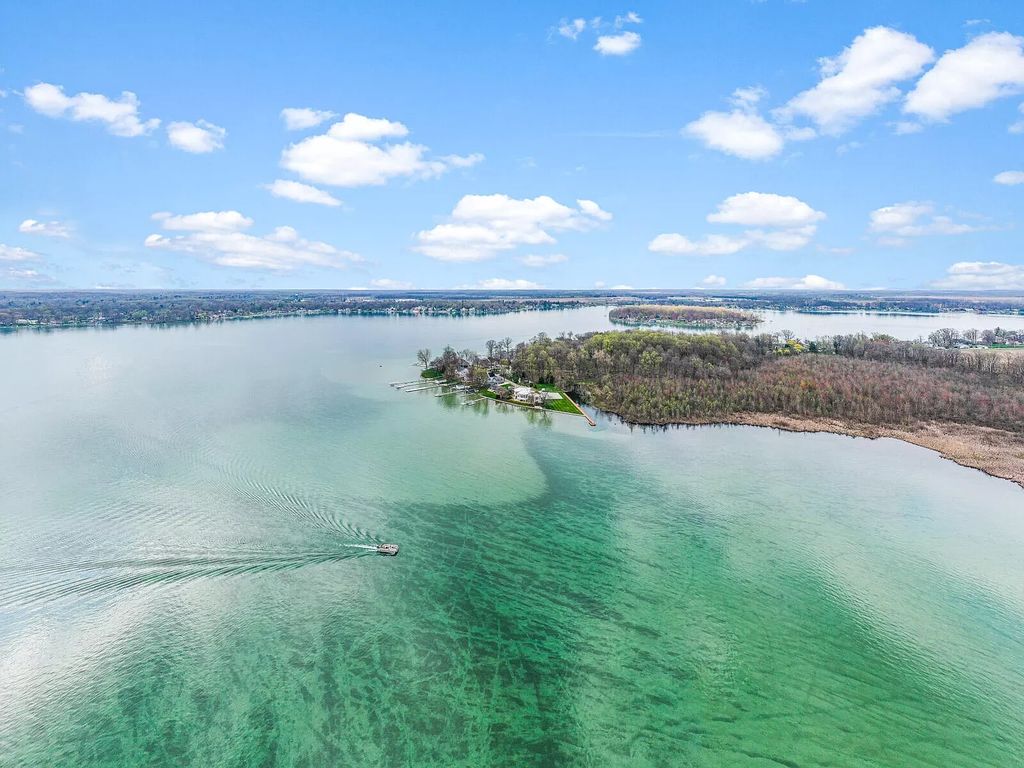 The House in Cassopolis has a Luxury Miami Vibe and a well-designed floor plan with separate split upper levels, now available for sale. This home located at 62234 Carlton Dr, Cassopolis, Michigan